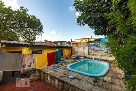 Piscina de casa à venda com 3 quartos, 150m² em Parque Urbano, Porto Alegre