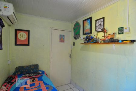 Quarto 1 de casa à venda com 4 quartos, 140m² em Guajuviras, Canoas