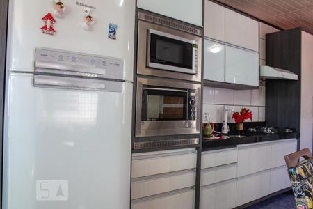 Casa à venda com 107m², 2 quartos e 4 vagas Casa à venda com 107m², 2 quartos e 4 vagasCozinha - Armários