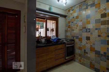 Cozinha de casa à venda com 4 quartos, 200m² em Cavalhada, Porto Alegre