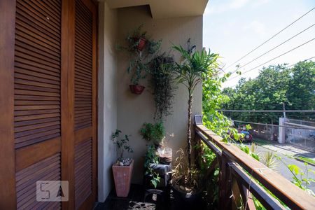 varanda de casa à venda com 3 quartos, 186m² em Jardim São Pedro, Porto Alegre