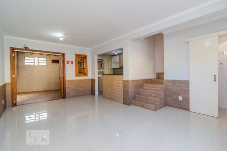 Sala de casa de condomínio à venda com 2 quartos, 150m² em Campo Novo, Porto Alegre