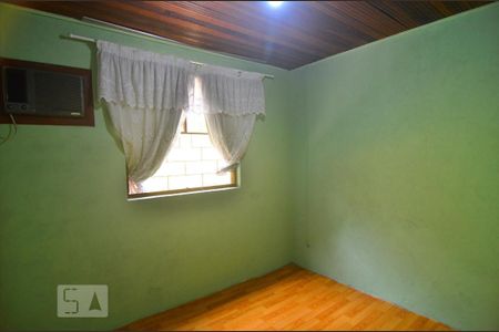 Quarto 2 de casa à venda com 3 quartos, 120m² em Guajuviras, Canoas