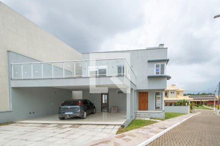 Casa de condomínio à venda com 240m², 4 quartos e 3 vagas Casa de condomínio à venda com 240m², 4 quartos e 3 vagasFachada