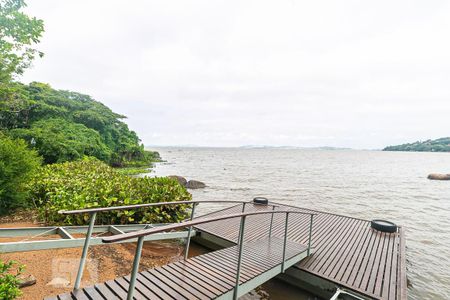 Casa de condomínio à venda com 407m², 4 quartos e 3 vagas Casa de condomínio à venda com 407m², 4 quartos e 3 vagasÁrea Externa