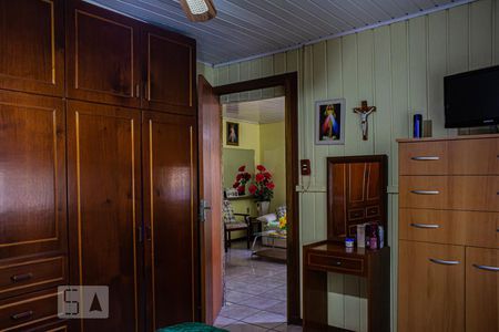 Quarto 1 de casa à venda com 5 quartos, 180m² em Igara, Canoas