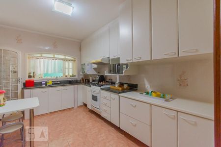 Casa à venda com 238m², 4 quartos e 4 vagas Casa à venda com 238m², 4 quartos e 4 vagasCozinha