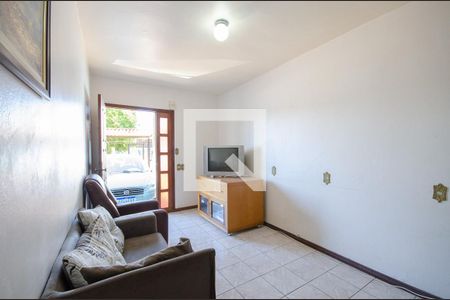 Sala de casa à venda com 4 quartos, 180m² em Vila Nova, Porto Alegre