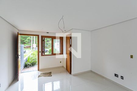 Sala de casa para alugar com 3 quartos, 150m² em Guarujá, Porto Alegre