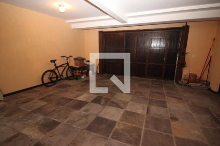 Casa de condomínio à venda com 367m², 4 quartos e 2 vagas Casa de condomínio à venda com 367m², 4 quartos e 2 vagasGaragem