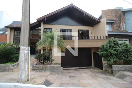 Casa de condomínio à venda com 367m², 4 quartos e 2 vagas Casa de condomínio à venda com 367m², 4 quartos e 2 vagasFachada