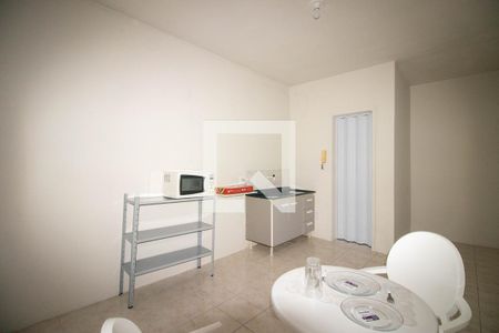 Sala e Cozinha de kitnet/studio para alugar com 1 quarto, 24m² em Rio Branco, Porto Alegre