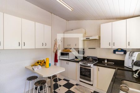 Casa de condomínio à venda com 430m², 3 quartos e 4 vagas Casa de condomínio à venda com 430m², 3 quartos e 4 vagasCozinha