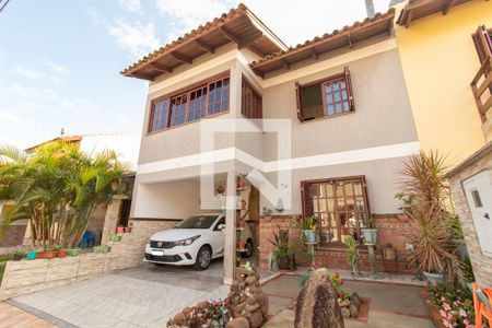 Casa de condomínio à venda com 178m², 3 quartos e 1 vaga Casa de condomínio à venda com 178m², 3 quartos e 1 vagaFachada
