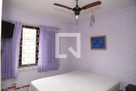 Quarto 1 de casa para alugar com 4 quartos, 191m² em Jardim Virgínia, Guarujá