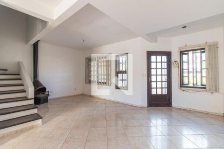 Sala de casa à venda com 3 quartos, 160m² em Guarujá, Porto Alegre