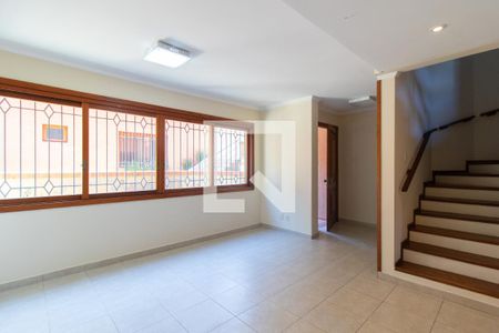 Sala de casa de condomínio para alugar com 4 quartos, 255m² em Vila Assunção, Porto Alegre