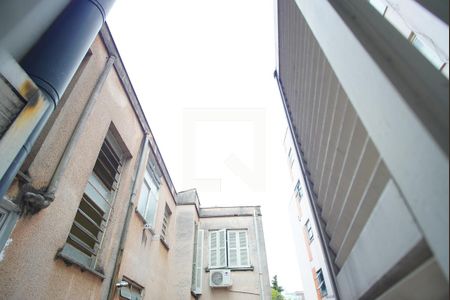 Sala_Vista de apartamento à venda com 2 quartos, 66m² em Auxiliadora, Porto Alegre