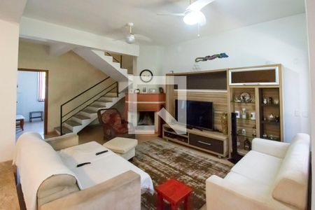 Sala de Estar de casa de condomínio à venda com 4 quartos, 284m² em Cavalhada, Porto Alegre