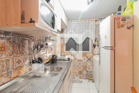 Cozinha e Área de Serviço de apartamento à venda com 2 quartos, 38m² em Campo Novo, Porto Alegre