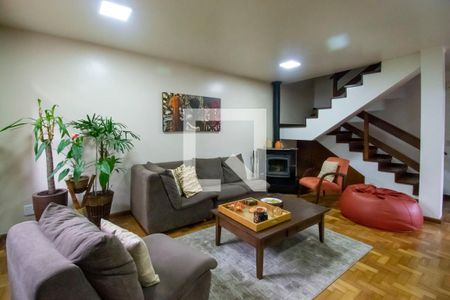 Sala de Estar de casa de condomínio à venda com 3 quartos, 150m² em Vila Nova, Porto Alegre