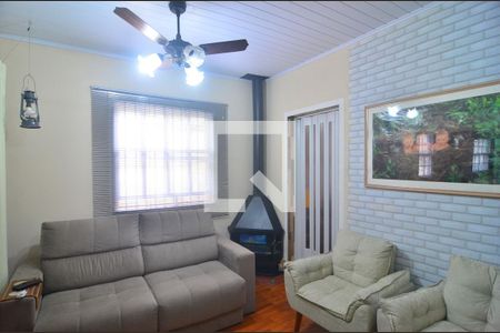 Sala de casa à venda com 3 quartos, 110m² em Rio Branco, Canoas