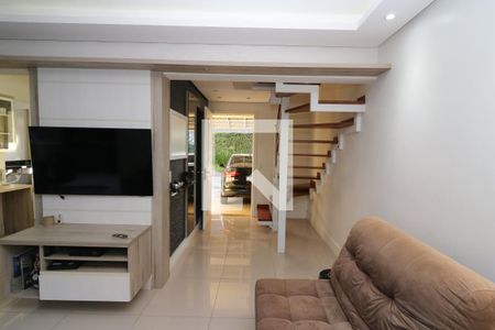 Sala de Estar de casa de condomínio à venda com 4 quartos, 215m² em Teresópolis, Porto Alegre