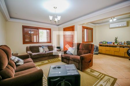 Sala de casa para alugar com 5 quartos, 360m² em Guarujá, Porto Alegre