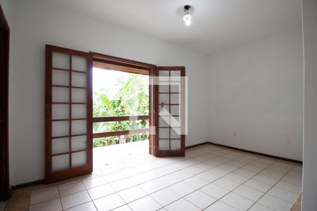 Sala/Quarto de casa de condomínio para alugar com 1 quarto, 55m² em Itacorubi, Florianópolis