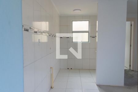 Cozinha e Área de Serviço de apartamento à venda com 2 quartos, 43m² em Campo Novo, Porto Alegre