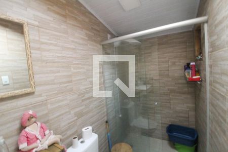 Banheiro da Suíte de casa à venda com 2 quartos, 80m² em Olaria, Canoas