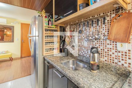 Cozinha e Área de Serviço de apartamento à venda com 2 quartos, 40m² em Campo Novo, Porto Alegre