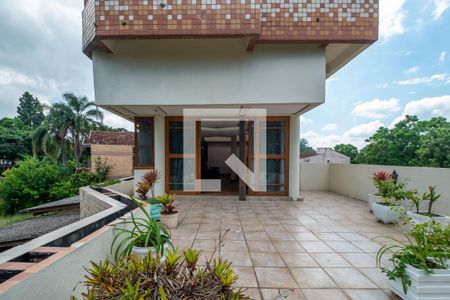 Varanda de casa à venda com 4 quartos, 574m² em Pedra Redonda, Porto Alegre
