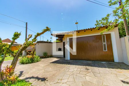 Fachada de casa à venda com 3 quartos, 120m² em Harmonia, Canoas