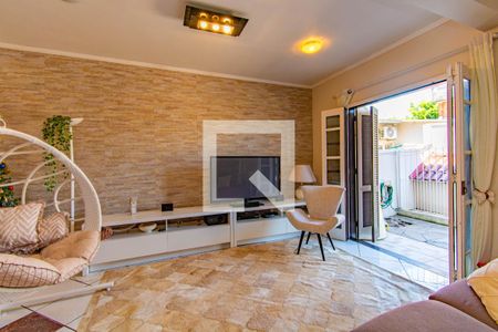 Sala de TV de casa à venda com 3 quartos, 120m² em Harmonia, Canoas