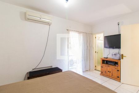 Quarto 1 - Suíte de casa de condomínio à venda com 4 quartos, 180m² em Cavalhada, Porto Alegre