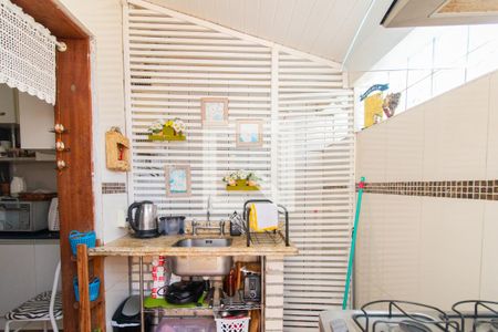 Casa de condomínio à venda com 180m², 4 quartos e 1 vaga Casa de condomínio à venda com 180m², 4 quartos e 1 vagaCozinha e Área de Serviço