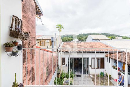 Sacada  de casa à venda com 4 quartos, 120m² em Hípica, Porto Alegre