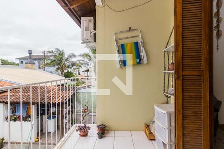 Sacada  de casa à venda com 4 quartos, 120m² em Hípica, Porto Alegre
