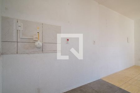 Cozinha e Área de Serviço de apartamento à venda com 2 quartos, 38m² em Vila Nova, Porto Alegre