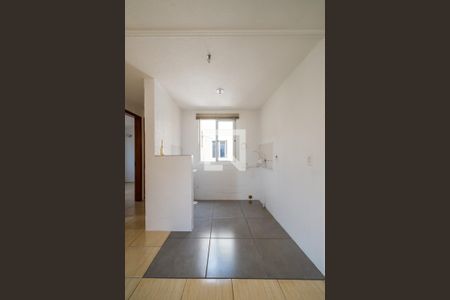 Cozinha e Área de Serviço de apartamento à venda com 2 quartos, 38m² em Vila Nova, Porto Alegre