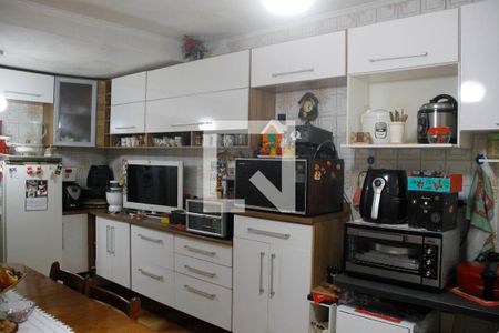 Casa à venda com 87m², 2 quartos e 2 vagas Casa à venda com 87m², 2 quartos e 2 vagasCozinha