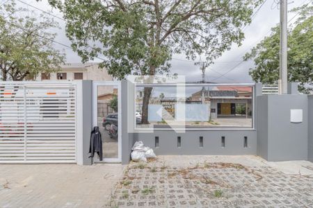 Sala/Cozinha-Vista de casa de condomínio à venda com 2 quartos, 49m² em Niterói, Canoas