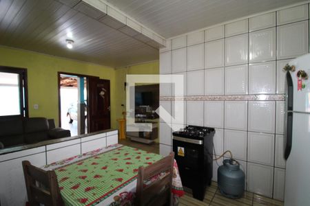 Cozinha com vista pra sala de casa à venda com 4 quartos, 380m² em Mathias Velho, Canoas