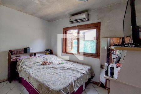 Quarto 1 de casa à venda com 2 quartos, 77m² em Guajuviras, Canoas