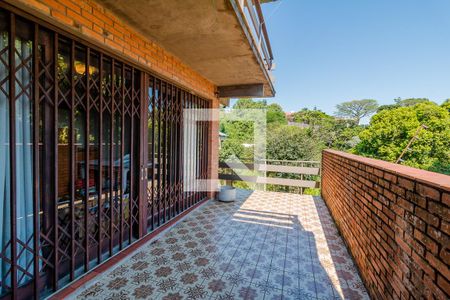 Varanda de casa à venda com 4 quartos, 400m² em Santa Tereza, Porto Alegre