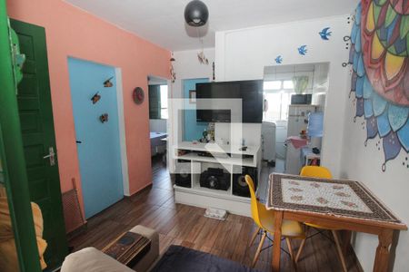 Sala de casa de condomínio à venda com 2 quartos, 46m² em Vila Nova, Porto Alegre