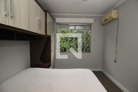 Quarto 1 de apartamento para alugar com 2 quartos, 59m² em Vila Nova, Porto Alegre