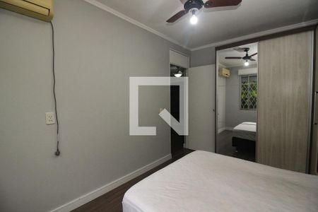 Quarto 1 de apartamento para alugar com 2 quartos, 59m² em Vila Nova, Porto Alegre