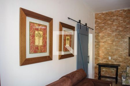 Sala - Detalhe Quadros de casa para alugar com 3 quartos, 150m² em Santinho, Florianópolis